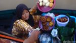 Peredaran dan Penukaran Uang di Pasar Terapung
