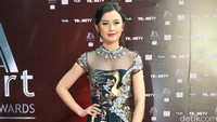 Ia mengenakan gaun rancangan Biyan. Noel/detikFoto.