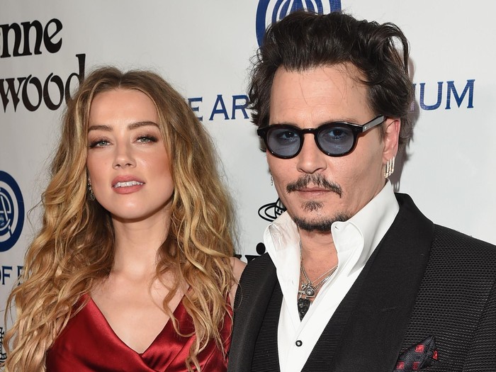 CULVER CITY, CA - JANUARY 09:  Actors Amber Heard (L) and Johnny Depp attend The Art of Elysium 2016 HEAVEN Gala presented by Vivienne Westwood & Andreas Kronthaler at 3LABS on January 9, 2016 in Culver City, California.  (Photo by Jason Merritt/Getty Images for Art of Elysium)