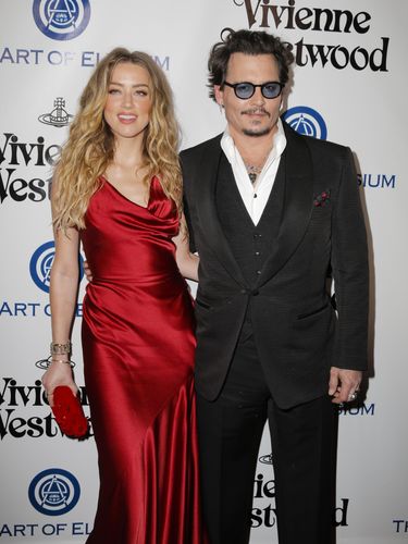 CULVER CITY, CA - JANUARY 09:  Actors Amber Heard (L) and Johnny Depp attend The Art of Elysium 2016 HEAVEN Gala presented by Vivienne Westwood & Andreas Kronthaler at 3LABS on January 9, 2016 in Culver City, California.  (Photo by Alison Buck/Getty Images)