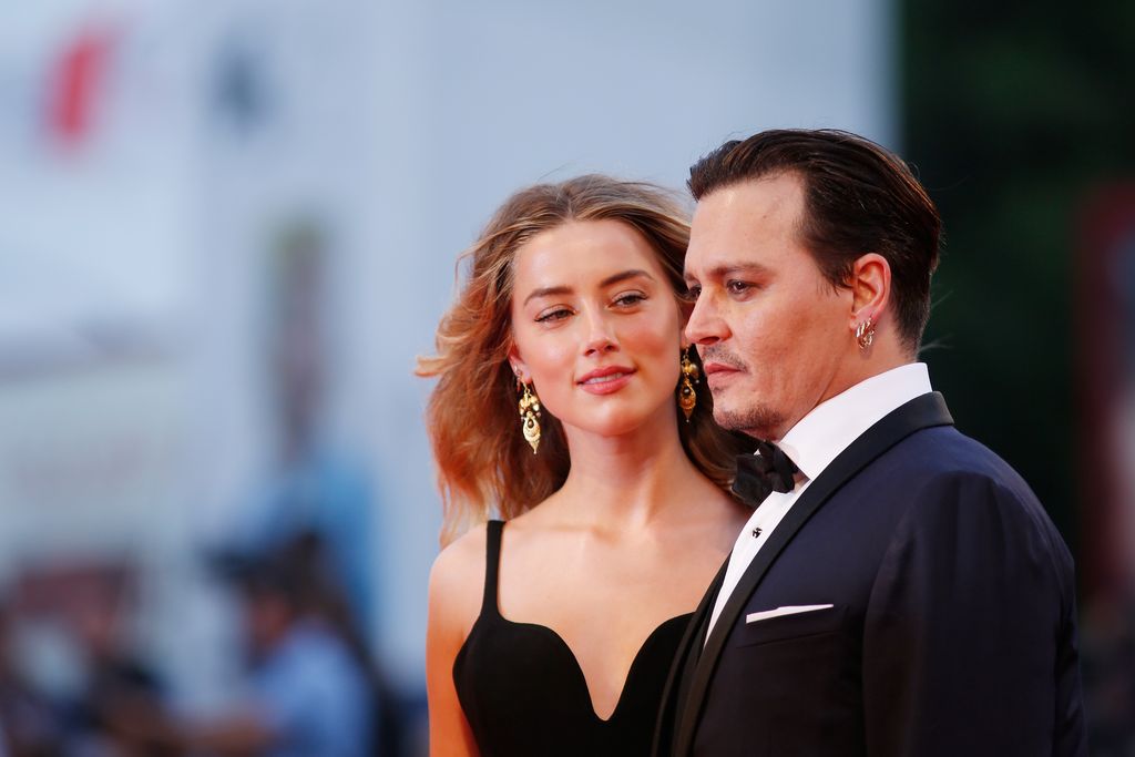 VENICE, ITALY - SEPTEMBER 04:  Johnny Depp and Amber Heard attend a premiere for 'Black Mass' during the 72nd Venice Film Festival at  on September 4, 2015 in Venice, Italy.  (Photo by Tristan Fewings/Getty Images)