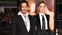 Amber Heard dan Johnny Depp resmi bercerai pada 13 Januari lalu. Jason Merritt/Getty Images/detikFoto.