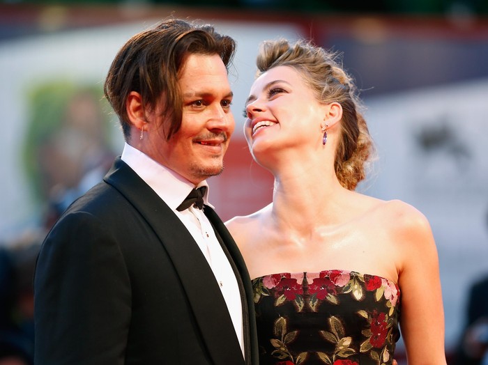 VENICE, ITALY - SEPTEMBER 05:  Johnny Depp and actress Amber Heard attend a premiere for The Danish Girl during the 72nd Venice Film Festival at  on September 5, 2015 in Venice, Italy.  (Photo by Tristan Fewings/Getty Images)