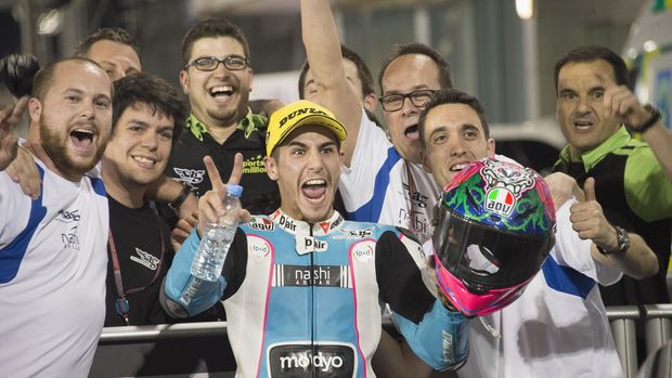 DOHA, QATAR - MARCH 20: Luis Salom of Spain and SAG Team celebrates with team under the podium at the end of the Moto2 race during the MotoGp of Qatar - Race at Losail Circuit on March 20, 2016 in Doha, Qatar. (Photo by Mirco Lazzari gp/Getty Images)