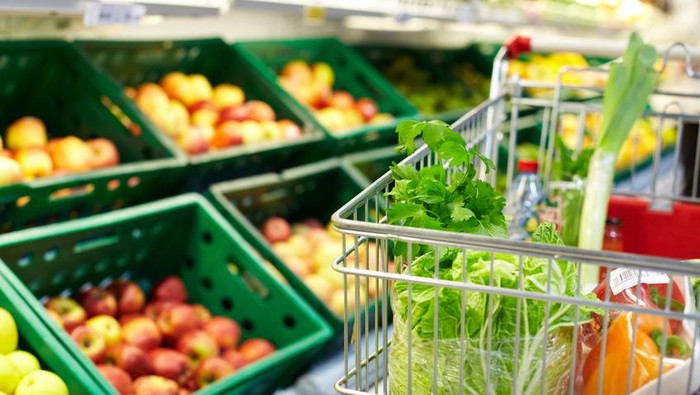 supermarket Image of fresh vegetables in cart in supermarket