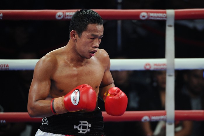 JAKARTA, INDONESIA - FEBRUARY 05:  Daud Yordan of Indonesia fights against Yoshitaka Kato of Japan during the WBO Asia Pacific Lightweight championship bout between Daud Yordan and Yoshitaka Kato at Balai Sarbini on February 5, 2016 in Jakarta, Indonesia.  (Photo by Robertus Pudyanto/Getty Images)