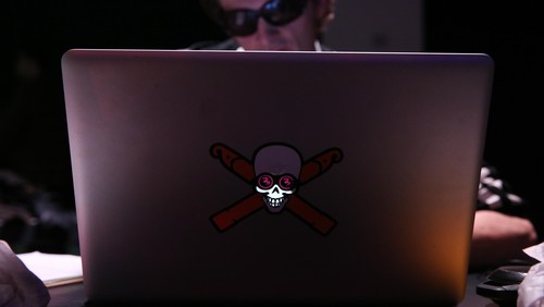 NEW YORK, NY - APRIL 15:  A hacker using a laptop computer at the Hacked By Def Con Press Preview during the 2016 Tribeca Film Festival at Spring Studios on April 15, 2016 in New York City.  (Photo by Rob Kim/Getty Images for Tribeca Film Festival)