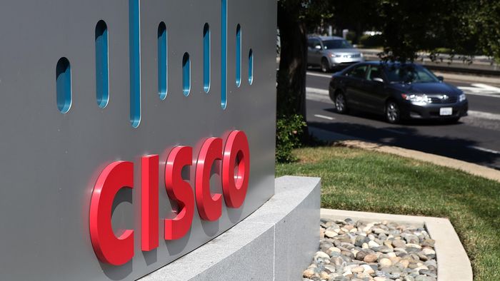 65871821 SAN JOSE, CA - AUGUST 10: A sign is posted in front of the Cisco Systems headquarters on August 10, 2011 in San Jose, California. Cisco Systems reported better-than-expected fourth quarter revenues with a 3.3 percent rise to $11.2 billion as the company continues to scale down its business. (Photo by Justin Sullivan/Getty Images)