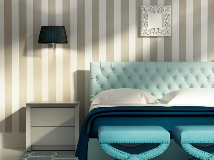 3d render of a contemporary elegant luxury bedroom with blue stools and a striped wallpaper
