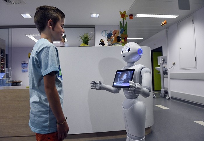 Ilustrasi robot. Foto: JOHN THYS/AFP/Getty Images Ilustrasi robot. Foto: JOHN THYS/AFP/Getty Images