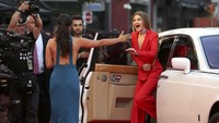 Gigi terlihat sumringah saat tiba di red carpet acara yang digelar pada Minggu (19/6/2016) waktu setempat. REUTERS/Peter Power/detikFoto.