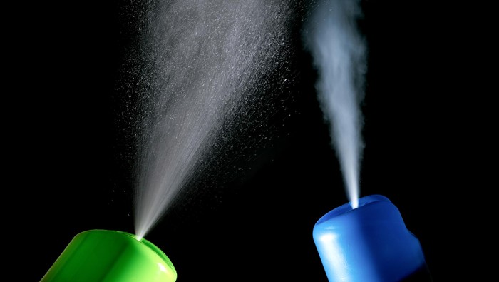 Two air freshener in different directions isolated on a black background