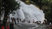 Air Terjun Bantimurung di Maros, selalu menjadi tempat liburan favorit warga Makassar. Kalau mudik Lebaran ke Makassar, jangan lupa datang ke sini (Fitraya/detikTravel)