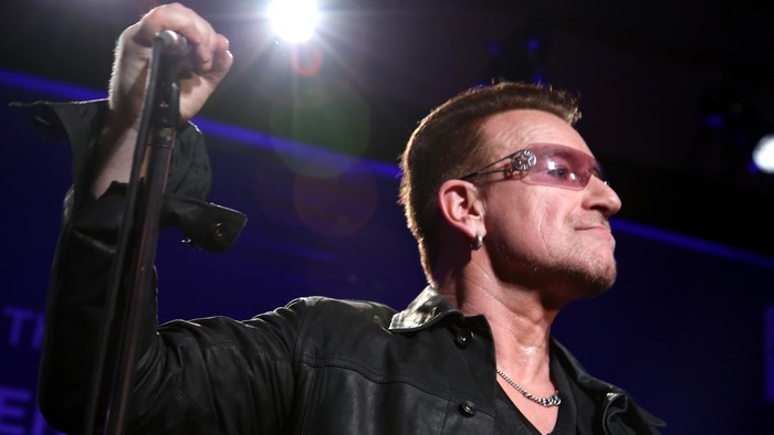 BEVERLY HILLS, CA - JANUARY 11: Bono of U2 performs onstage during the 3rd annual Sean Penn & Friends HELP HAITI HOME Gala benefiting J/P HRO presented by Giorgio Armani at Montage Beverly Hills on January 11, 2014 in Beverly Hills, California.  (Photo by Jonathan Leibson/Getty Images for J/P Haitian Relief Organization)
