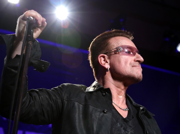 BEVERLY HILLS, CA - JANUARY 11: Bono of U2 performs onstage during the 3rd annual Sean Penn & Friends HELP HAITI HOME Gala benefiting J/P HRO presented by Giorgio Armani at Montage Beverly Hills on January 11, 2014 in Beverly Hills, California.  (Photo by Jonathan Leibson/Getty Images for J/P Haitian Relief Organization)