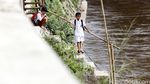 Minim Lahan, Anak-anak Bermain di Jalan dan Bantaran Sungai