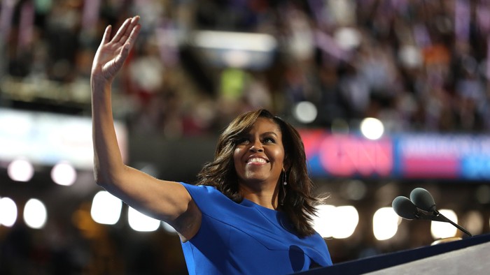 PHILADELPHIA, PA - JULY 25: First lady Michelle Obama walks on stage to deliver remarks on the first day of the Democratic National Convention at the Wells Fargo Center, July 25, 2016 in Philadelphia, Pennsylvania. An estimated 50,000 people are expected in Philadelphia, including hundreds of protesters and members of the media. The four-day Democratic National Convention kicked off July 25. (Photo by Alex Wong/Getty Images)