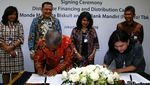 Perjanjian Kerja Sama Bank Mandiri dan Khong Guan Group