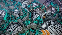 Anda tentunya sudah bisa menebak mural siapa ini? Iya, ini adalah karya Darbotz yang berkolaborasi dengan Bernhard Suryadiningrat. (dok. Bali Street Art Festival)