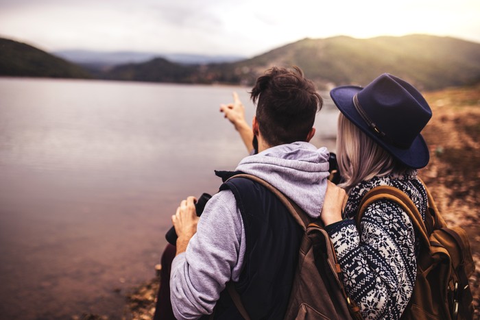 Happy hipster couple on an adventure