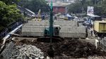 Perbaikan Jembatan Besi Latumenten