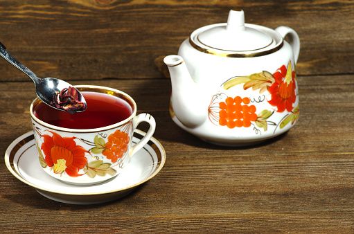 cup of tea hibiscus     on a wooden background