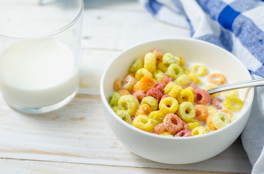 Morning meal, Colorful cereal with milk in white bowl