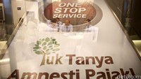 Gerai tersebut mengkampanyekan program Yuk Tanya Amnesty Pajak.