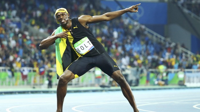 usain bolt 2016 Rio Olympics - Athletics - Final - Mens 100m Final - Olympic Stadium - Rio de Janeiro, Brazil - 14/08/2016. Usain Bolt (JAM) of Jamaica poses after winning the gold. REUTERS/Lucy Nicholson TPX IMAGES OF THE DAY. FOR EDITORIAL USE ONLY. NOT FOR SALE FOR MARKETING OR ADVERTISING CAMPAIGNS.