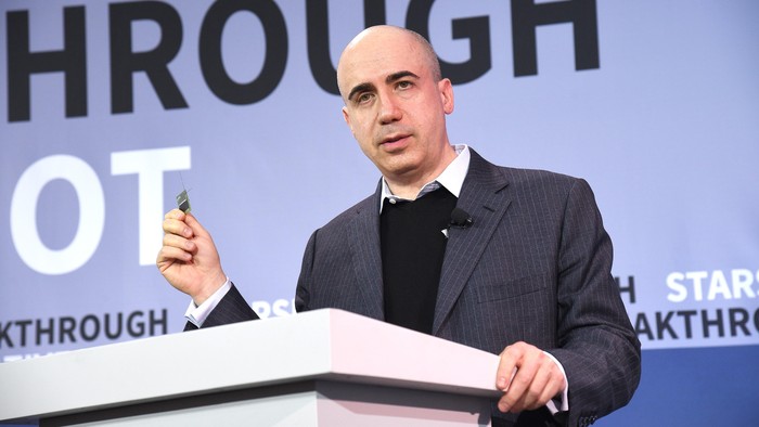 NEW YORK, NEW YORK - APRIL 12:  Yuri Milner, Breakthrough Prize and DST Global Founder, demonstrates a new chip on stage as Yuri Milner and Stephen Hawking host press conference to announce Breakthrough Starshot, a new space exploration initiative, at One World Observatory on April 12, 2016 in New York City.  (Photo by Bryan Bedder/Getty Images for Breakthrough Prize Foundation)