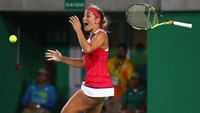 Sejarah dibuat Monica Puig saat merebut medali emas cabang tenis. Dia menjadi atlet pertama yang mempersembahkan emas untuk negaranya Puerto Rico (Clive Brunskill/Getty Images).