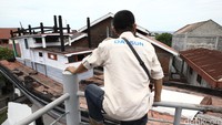 Risers melihat Monumen Kapal di Atas Rumah di Desa Lampulo. Saat terjadi tsunami, kapal tersebut dapat menyelamatkan 59 warga di sana.