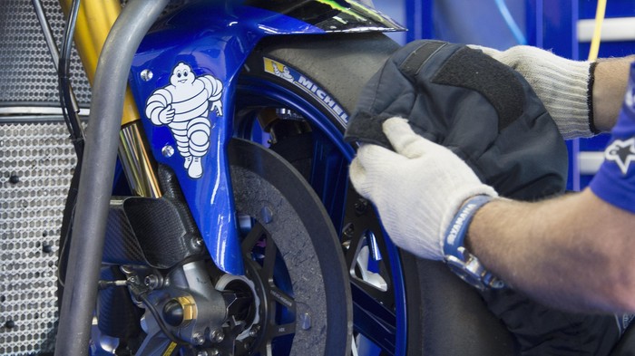 VALENCIA, SPAIN - NOVEMBER 10:  Michelin staff works in box during the first day of MotoGp Tests In Valencia at Ricardo Tormo Circuit on November 10, 2015 in Valencia, Spain.  (Photo by Mirco Lazzari gp/Getty Images)