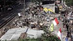 Ekskavator Ratakan Bangunan di Rawajati