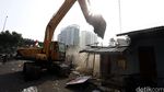 Ekskavator Ratakan Bangunan di Rawajati