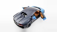 Amalgam Collection, menawarkan replika Bugatti Chiron berskala 1:8. Replika ini dibuat dengan tangan yang memanfaatkan data CAD asli yang disediakan Bugatti.