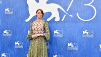Emma Stone saat tampil di sesi foto untuk mempromosikan film komedi romantis terbarunya La La Land di pembukaan Venice Film Festival ke-73 di Venice, Italia, Rabu (31/8/2016). Pascal Le Segretain/Getty Images/detikFoto.