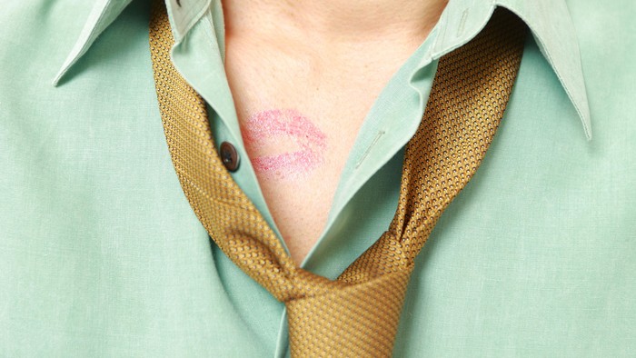 man with lipstick mark.
