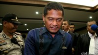 Rohadi meninggalkan Pengadilan Tipikor, Jakarta.