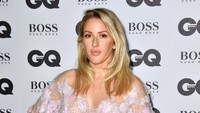 Ellie tampil menawan dengan mini dress. Gareth Cattermole/Getty Images/detikFoto.