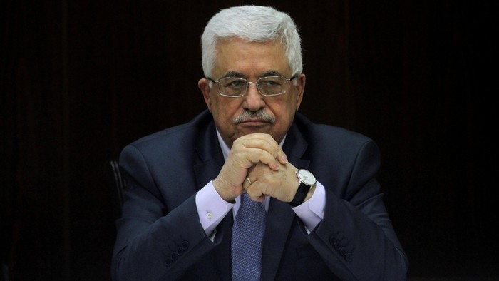 Palestinian President Mahmoud Abbas heads a Palestinian cabinet meeting in the West Bank city of Ramallah July 28, 2013. REUTERS/Issam Rimawi/Pool/File Photo