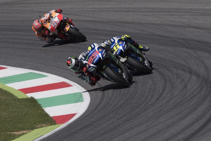 SCARPERIA, ITALY - MAY 22:  Jorge Lorenzo of Spain and Movistar Yamaha MotoGP leads Valentino Rossi of Italy and Movistar Yamaha MotoGP and Marc Marquez of Spain and Repsol Honda Team during the MotoGp of Italy - Race at Mugello Circuit on May 22, 2016 in Scarperia, Italy.  (Photo by Mirco Lazzari gp/Getty Images)