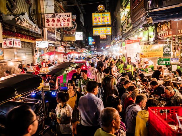Crowd walking on Yaowarat Road Chinatown Bangkok. All the area is very popular at night because of the excellent street food
