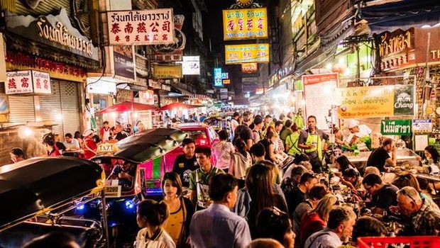Crowd walking on Yaowarat Road Chinatown Bangkok. All the area is very popular at night because of the excellent street food