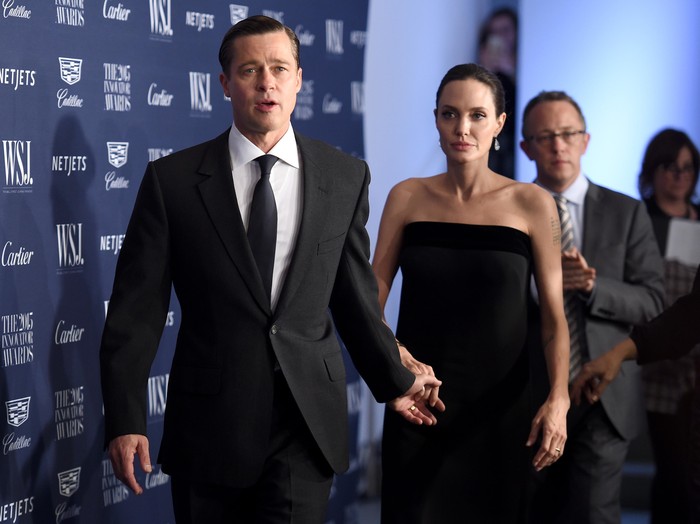 HOLLYWOOD, CA - NOVEMBER 05:  Writer-director-producer-actress Angelina Jolie Pitt (L) and actor-producer Brad Pitt attend Audi at the opening night gala premiere of By the Sea during AFI FEST 2015 presented by Audi at TCL Chinese 6 Theatres on November 5, 2015 in Hollywood, California  (Photo by Jonathan Leibson/Getty Images for Audi)