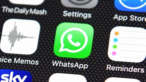 LONDON, ENGLAND - AUGUST 03:  A persons finger is posed next to the Whatsapp app logo on an iPhone on August 3, 2016 in London, England.  (Photo by Carl Court/Getty Images)