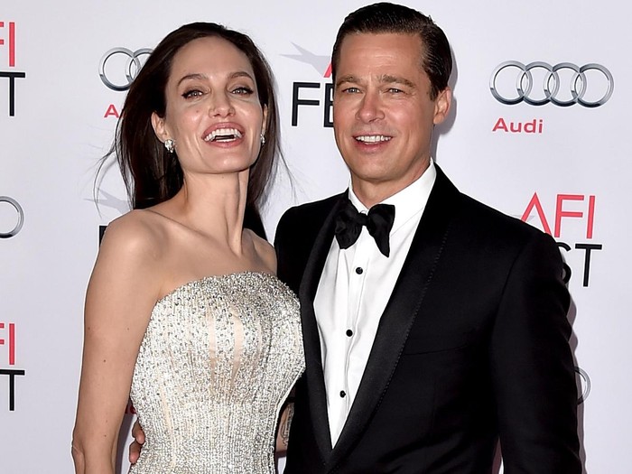 LOS ANGELES, CA - NOVEMBER 05:  Actress/director Angelina Jolie Pitt (L) and husband actor Brad Pitt arrive at the AFI FEST 2015 presented by Audi opening night gala premiere of Universal Pictures By The Sea at the Chinese Theatre on November 5, 2015 in Los Angeles, California.  (Photo by Kevin Winter/Getty Images)