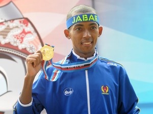 Agus Prayogo Gondol Emas Lari 5.000 Meter