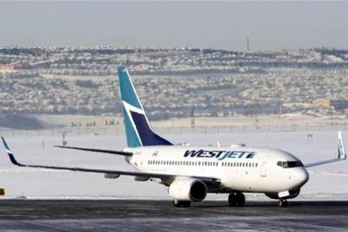 A WestJet Airlines Boeing 737-700 aircraft lands at Calgary International Airport in Alberta January 7, 2010. REUTERS/Todd Korol