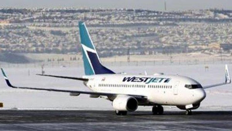 Ilustrasi Pesawat West Jet (Todd Korol/Reuters) Ilustrasi Pesawat West Jet (Todd Korol/Reuters)